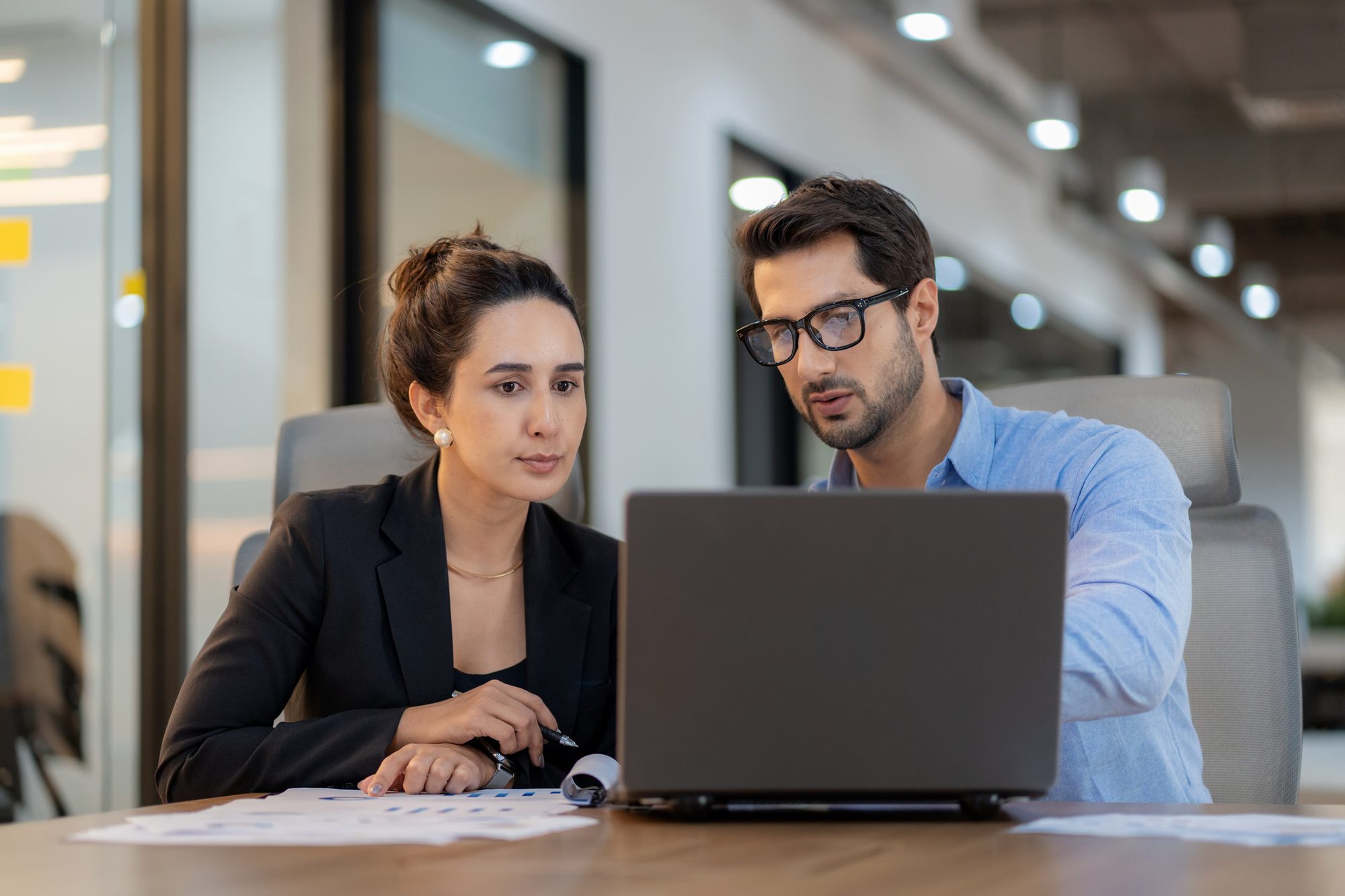 Adviser working with client